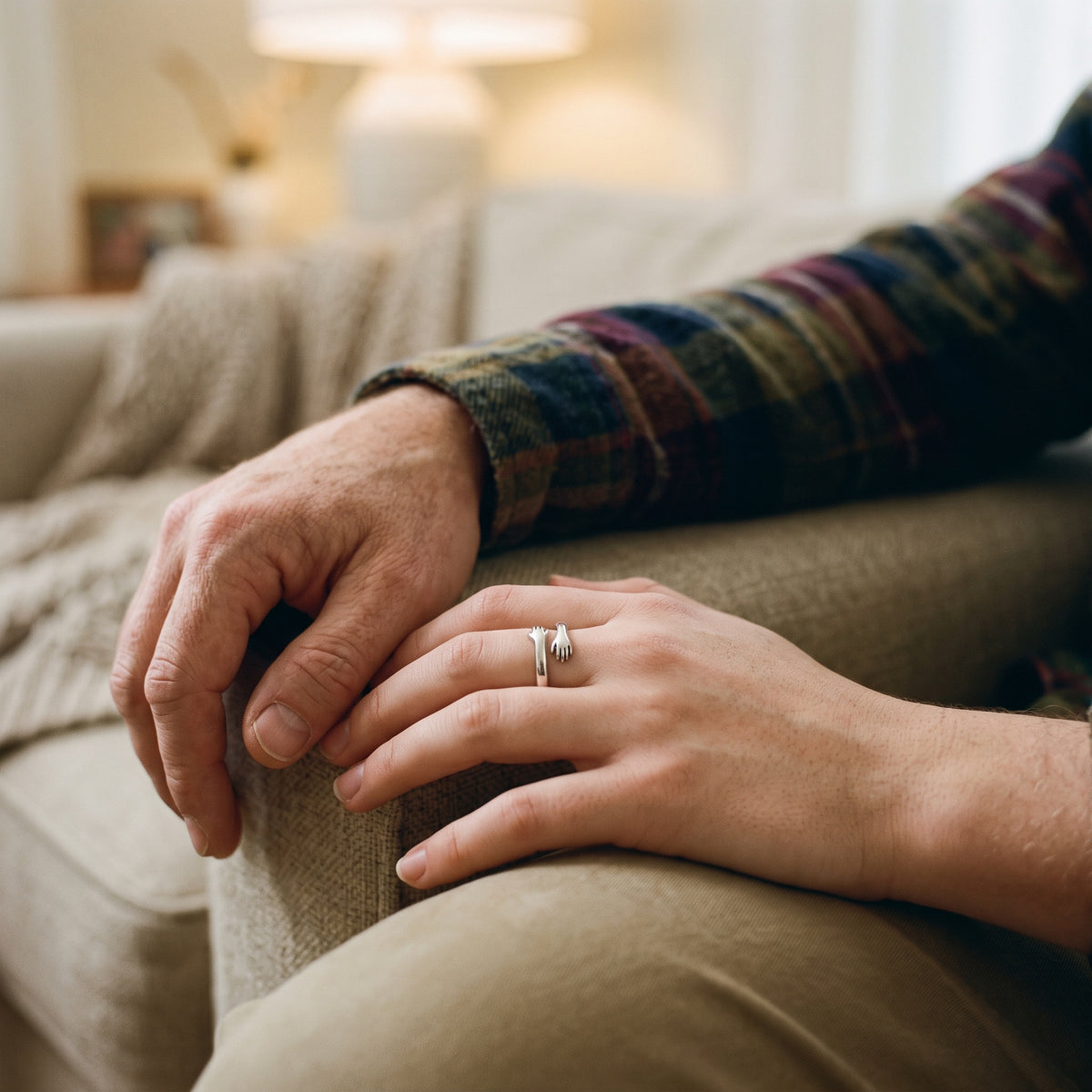 Daughter wearing the hug ring next to her dad
