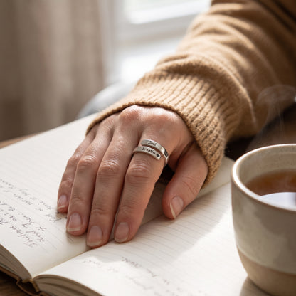 Just Breathe ring worn while journaling