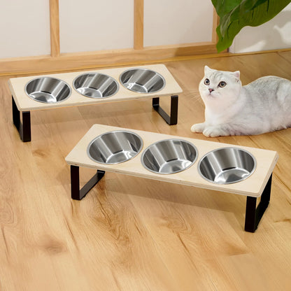 Two bowl stands side by side with a white cat