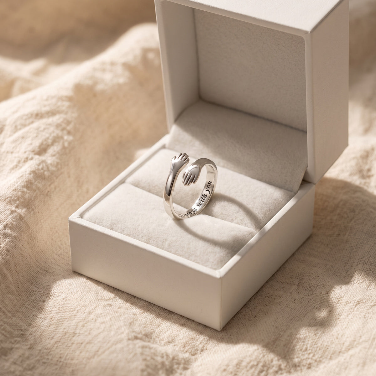 To My Granddaughter Hug Ring in its gift box