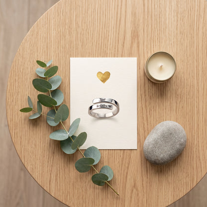 Just Breathe ring on a keepsake card with eucalyptus